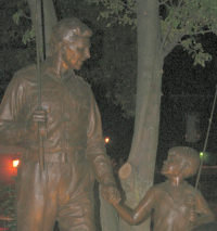 Statue at Night in front of Playhouse