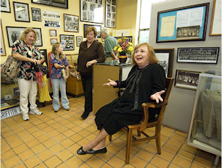 Betty Lynn with collection of Andy items