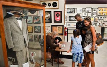 Betty Lynn signing photos in the Andy Griffith Museum