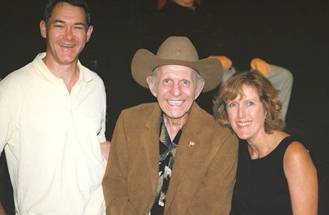 Brook Alexander (left) and his wife, Jana, visit TAGSRWC Co-founder with Doug Dillard